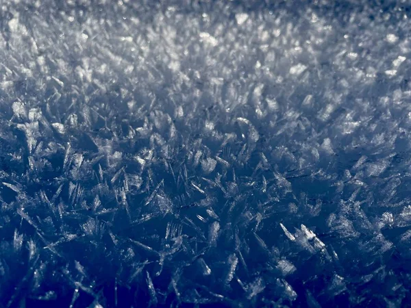 Close up of snow crystals, wallpaper background. High quality photo