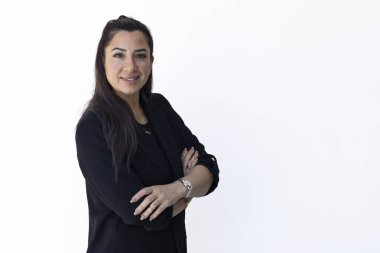 Portrait of confident entrepreneur mother standing with arms crossed against white background