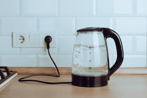 A Glass Electric Kettle With Boiling Water Inside Stock Photo