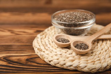 Chia tohumlu kase ve kaşık, yakından. Süper yiyecek. Sağlıklı yiyecekler. Diyet olsun. Düzgün beslenme kavramı. Antioksidan. Metin için yer, kopyalamak için yer.