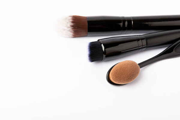 Makeup brushes isolated on white background. Visagiste.