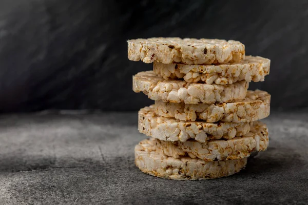 Rice cakes on a textured table. Close-up. Healthy food. Diet food.Place for text.Space for copy.