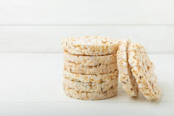 Rice cakes on a white texture background. Bread. Airy rice bread. dietary crispy round rice cakes. Place for text. Place to copy. Healthy food. dietary product.
