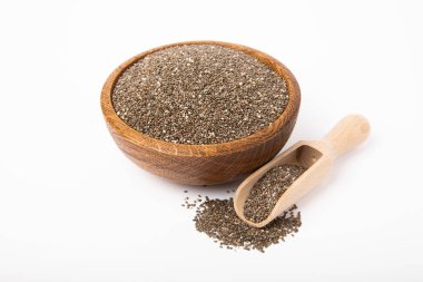 Chia seeds in a bowl isolated on a white background.