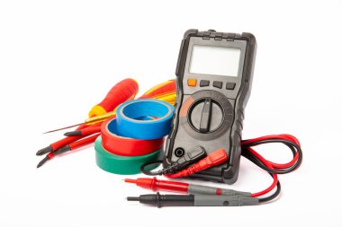 Electrician tools isolated on white background.Electrician tools set. Multimeter, construction tape, electrical tape, screwdrivers, pliers and an automatic insulation stripper.