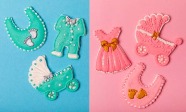 Baby shower cookies on a colorful bright background. Delicious cookies for a baby party. Baby shower party concept. Flat lay. View from above. candy bar
