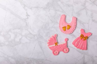 Baby shower cookies on a marble background. Gender cookies. Candy bar holiday baby shower party. Gender party. Holiday concept.