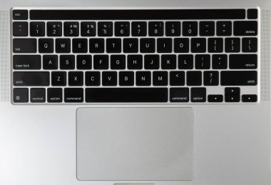 Keyboard of a modern laptop. white and black. Mocap. Place for text. Place to copy. Laptop on the office desk. Business concept.