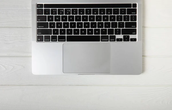 Keyboard of a modern laptop. white and black. Mocap. Place for text. Place to copy. Laptop on the office desk. Business concept.