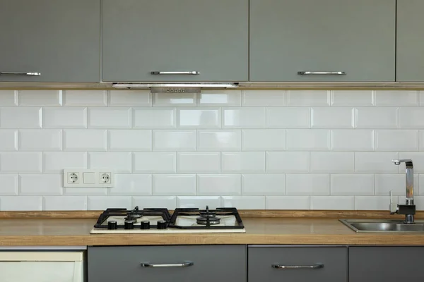 Blurred background interior design, scandinavian minimalist classic kitchen with wood and gray details. DESIGN. MOCKUP
