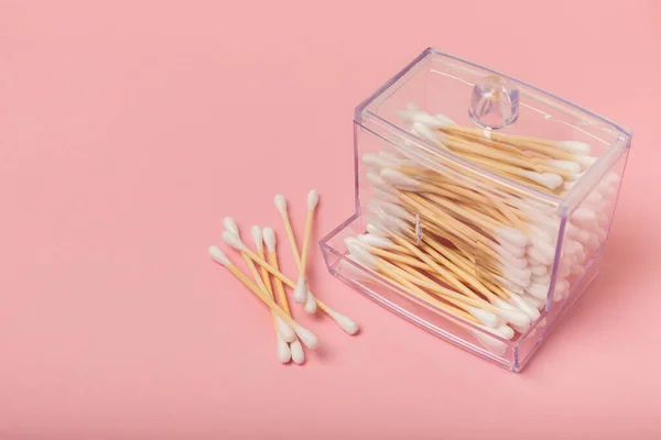 stock image Eco-friendly cotton swab, bamboo cotton buds on a pink background. Waste-free cosmetics without plastic. Eco goods. hygiene. Place for text. Place to copy.