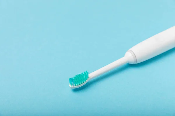 Cepillo Dientes Eléctrico Sonic Sobre Fondo Azul Higiene Oral Cuidado — Foto de Stock