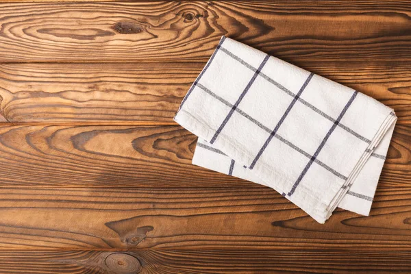 Küchentuch Auf Braunem Holzgrund Küchenutensilien Und Textilservietten Ein Stapel Baumwollhandtücher — Stockfoto