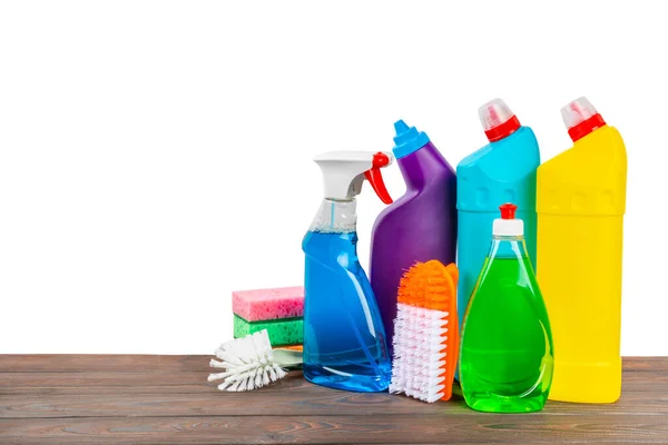 Cleaning products for home cleaning isolated on white background. Cleaning concept. Close-up. Household chemicals.Cleaning and detergents in plastic bottles, sponges and gloves.Mockup. Design.