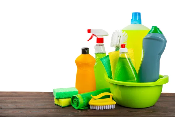 Cleaning products for home cleaning isolated on white background. Cleaning concept. Close-up. Household chemicals.Cleaning and detergents in plastic bottles, sponges and gloves.Mockup. Design.