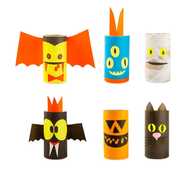 Toilet paper crafts isolated on white background. Kids crafts made with toilet paper roll. DIY. Handmade. Paper monster toys. Origami animals. Concept of children\'s educational games.