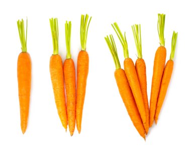 Beyaz arka planda izole edilmiş havuç. Beyaz arka planda taze ve organik havuçlar. Havuç dilimleri. Vejetaryen.