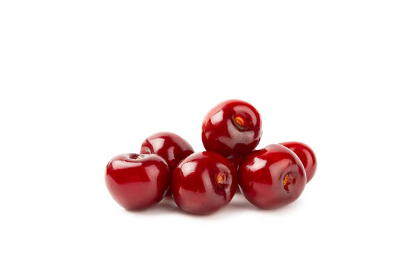 Cherry isolated. Fresh ripe cherries with leaves isolated on a white background.Sweet cherries pile. Berries and fruits. Vegan. Healthy eating.