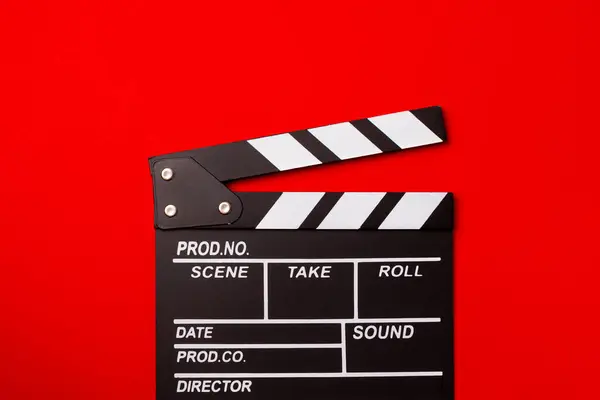Movie clapper. Movie clapperboard on a bright colored background. Concept of rest and entertainment. Concept of cinema. Film director. Producer. Business and profession. Place for text. Copy space