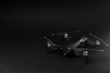 Drone unmanned aircraft on textured background. Modern FPV drone on background. The drone quadcopter. aircraft on the radio control. Drone for racing, filming and entertainment. clipart