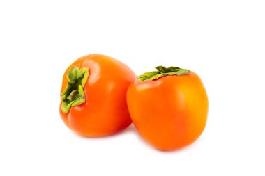 Hurma, beyaz arka planda izole edilmiş. Hurma meyvesi. Bir dilim olgun, sulu, tatlı hurma meyvesi. Vejetaryen. Meyve bahçesi. Yakın plan..