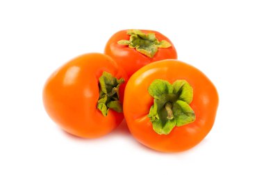 Hurma, beyaz arka planda izole edilmiş. Hurma meyvesi. Bir dilim olgun, sulu, tatlı hurma meyvesi. Vejetaryen. Meyve bahçesi. Yakın plan..