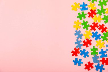 Autism puzzle.Autism awareness day. Colorful bright puzzles.Puzzle. 2 April world autism awareness day background. Top view. Space for text.Copy space.Design element.Care Awareness campaign for Autism clipart