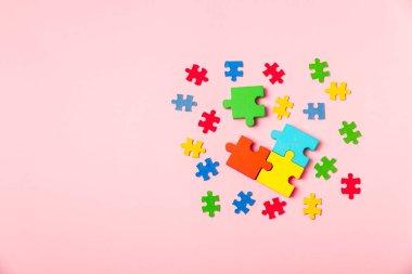 Autism puzzle.Autism awareness day. Colorful bright puzzles.Puzzle. 2 April world autism awareness day background. Top view. Space for text.Copy space.Design element.Care Awareness campaign for Autism clipart