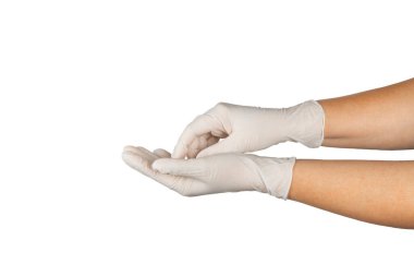 Beyaz arka planda izole edilmiş tıbbi nitril eldivenler. Cerrahi lateks eldivenler. Lastik eldiven üretimi. Doktor ya da hemşire koruyucu eldiven takıyor. Tıp konsepti. Kısırlık, koruma.