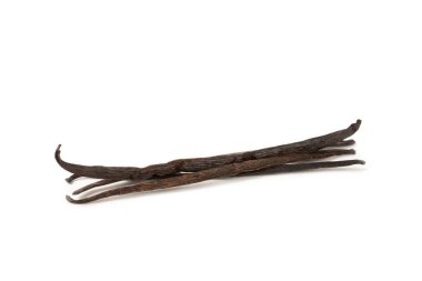Beyaz arka planda izole edilmiş vanilya kabukları. Vanilya çiçekleri ve tohumlar. Vanilyalı fasulye. Hamur işleri ve tatlılar için baharatlı baharat. Baharat. Mesaj için yer var. Boşluğu Kopyala