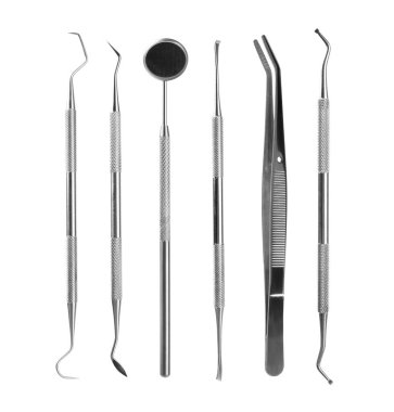 Dişçi araçları beyaz arkaplanda izole edildi. Diş hekimi konsepti. Diş bakımı, diş sağlığı konsepti. Ağız boşluğuna dikkat etmek anlamına geliyor. Diş modeli ve dişçi aletleri. Diş hijyeni.. 