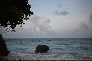 View of the sea and rocks by the sea in Papua, Indonesia