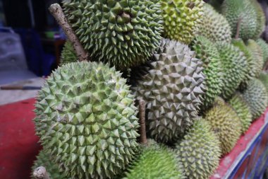 Durian fruit on display at a local roadside hawker stall