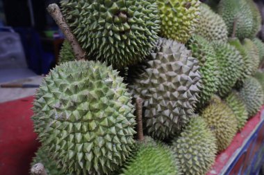 Durian fruit on display at a local roadside hawker stall