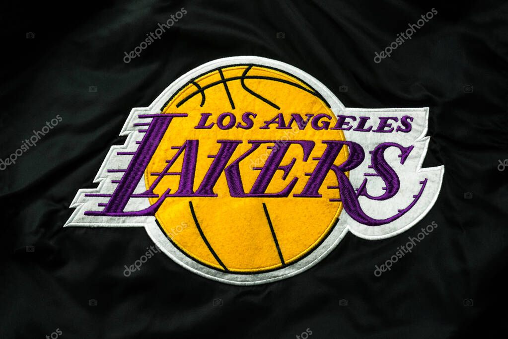 Closeup of Los Angeles Lakers team logo brand on the textile. Los Angeles Lakers team logo of professional basketball club in american league. Illustrative editorial