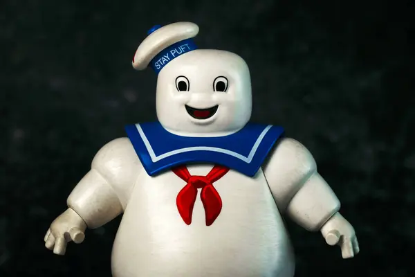 stock image Playmobil Stay Puft Marshmallow Man character of the movie Ghostbusters over dark background. Illustrative editorial