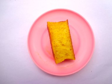 Bika ambon, geleneksel Endonezya aperatifi, bal peteği ve yumuşak dokusuna sahip, altın renkli. Servis çoktan kesildi..