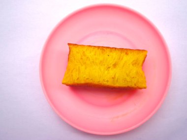 Bika ambon, geleneksel Endonezya aperatifi, bal peteği ve yumuşak dokusuna sahip, altın renkli. Servis çoktan kesildi..