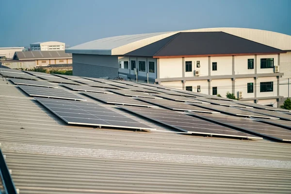 Technology solar cells, solar cells on the roof of factory.. maintenance in solar power plant to innovation of green energy