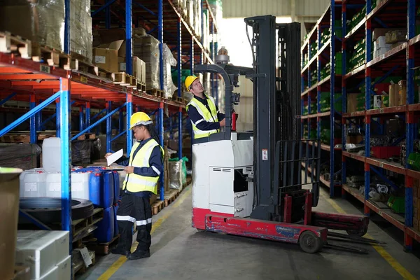 Workers at warehouse. Distribution, logistics concept