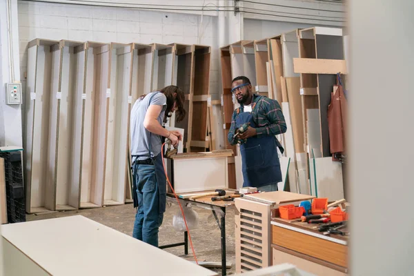 stock image Carpenter working on the woodworking desk and furniture handmade with wood