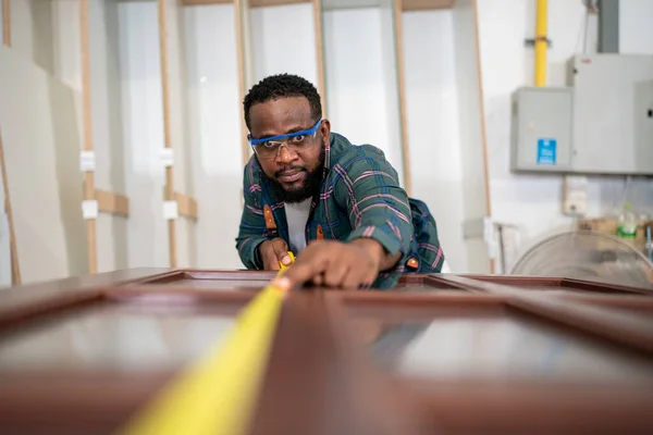 stock image Carpenter working on the woodworking desk and furniture handmade with wood