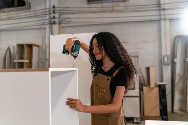 stock image Carpenter working on the woodworking desk and furniture handmade with wood