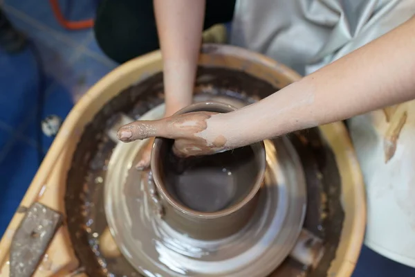 Close Craftswoman Apron Sitting Pottery Wheel Using Craft Tool While — Stock Photo, Image