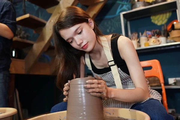 Close Concentrated Beautiful Craftswoman Apron Sitting Pottery Wheel Using Craft — Stock Photo, Image