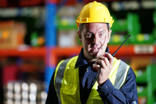 stock image Warehouse Industrial supply chain and Logistics Companies inside. Warehouse workers checking the inventory. Products on inventory shelves storage.