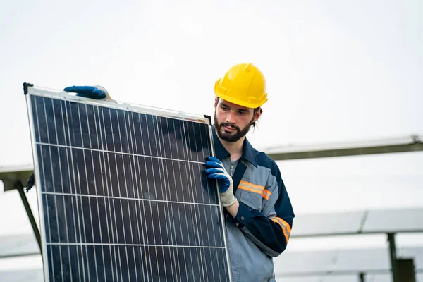 Engineer  is installing and checking an operation of sun and cleanliness of photovoltaic solar panels, Engineer with energy measurement tool photovoltaic modules for renewable energy