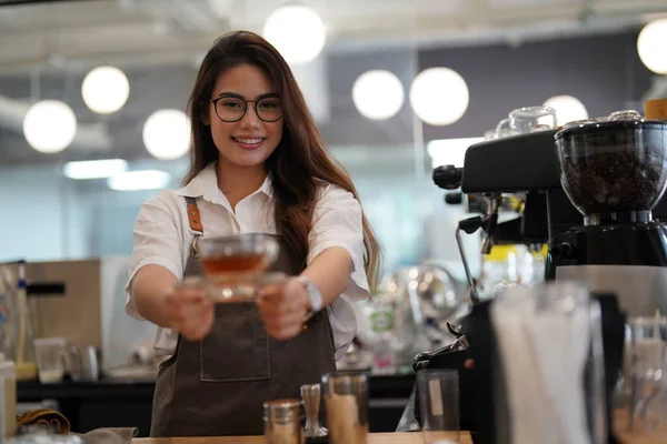 Cafe or coffee shop barista, entrepreneur and female small business owner of successful modern