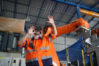 Robotik Silah Mühendisi, bir Yapay Zeka Bilgisayar İşlemcisi Birimi yazılımı ile ekipmanları kontrol ediyor