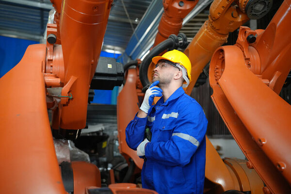 Robotic Arm engineer checking equipment of Artificial Intelligence Computer Processor Unit
